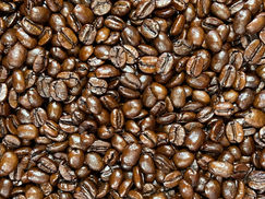 a close up of roasted coffee beans