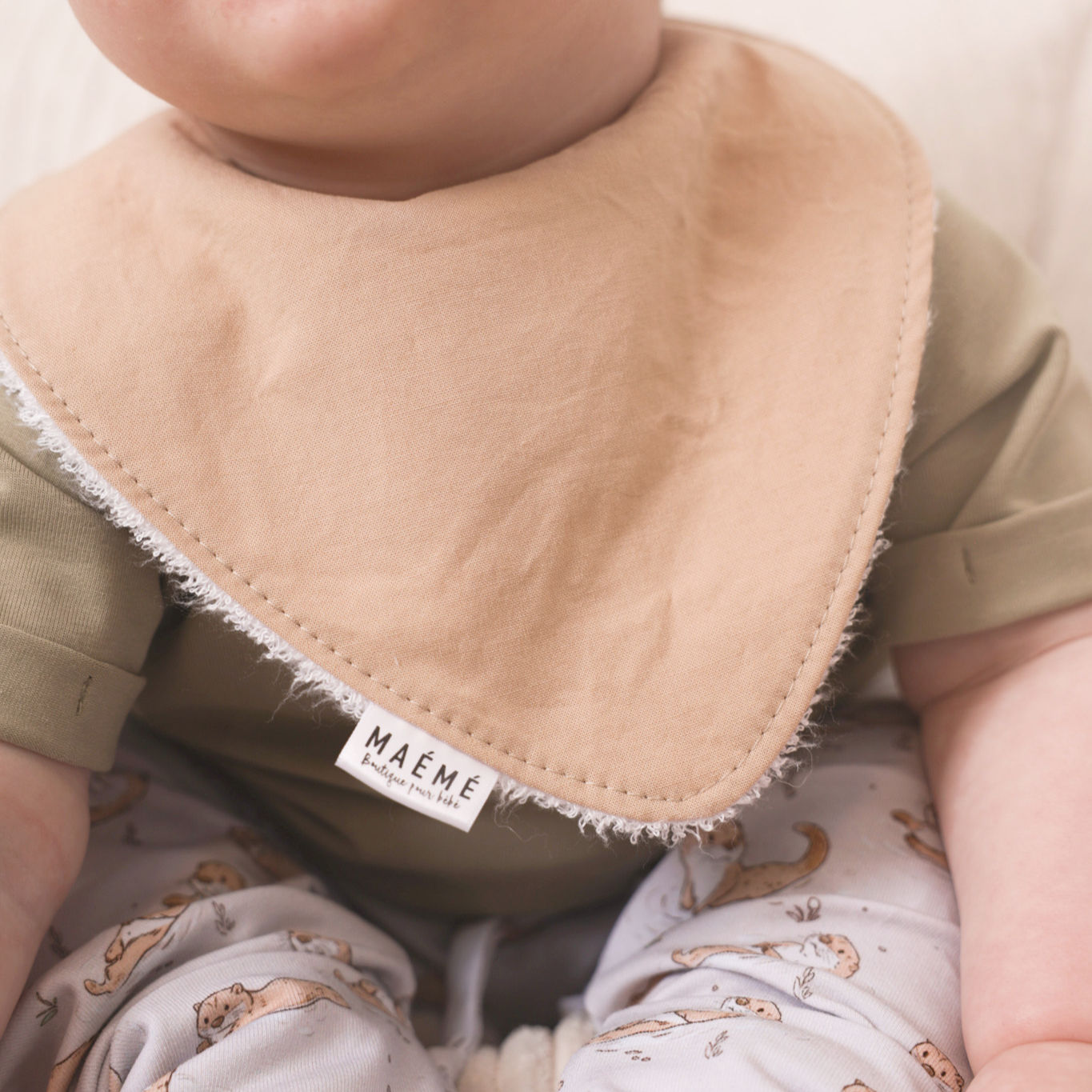 Bavoir beige uni