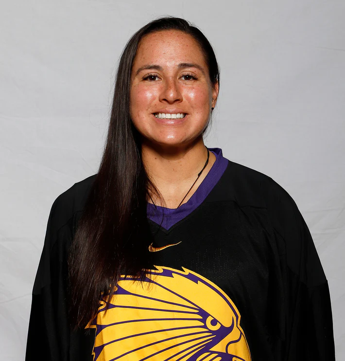 Trisha-John-headshot-cropped.webp