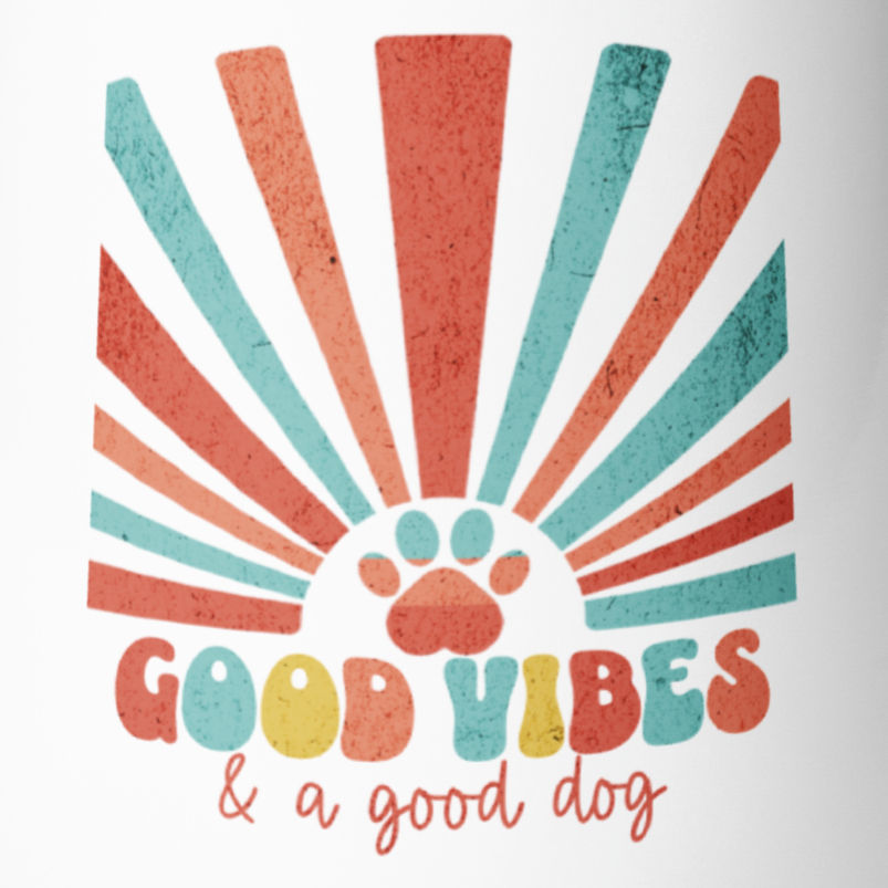 Thumbnail: Close-up of white stainless steel wine tumbler with stylized sunburst graphic featuring and 'good vibes and a good dog'