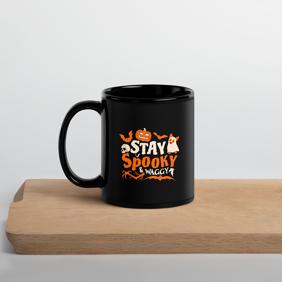Thumbnail: 11 oz Black ceramic mug with Halloween-themed “Stay Spooky & Waggy” design featuring a ghost dog, pumpkins, bats, and skulls.