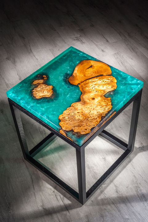 Scottish Oak Burr lamp table with a river of sea green resin and cuboid base.