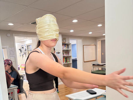 a girl walking blindfolded