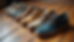 High angle view of a collection of gorpcore sneakers in different earth tones