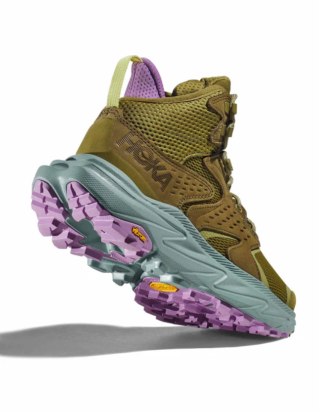 Hoka olive green hiking boot with blue and purple sole