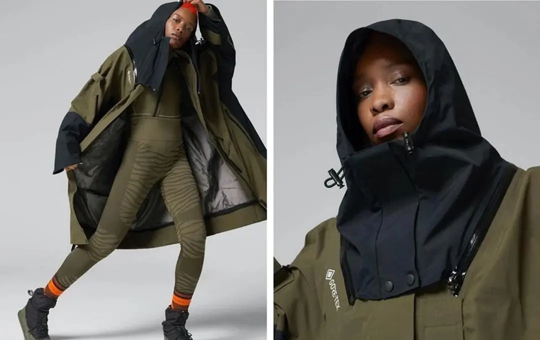 Woman in olive green hooded jacket and textured outfit