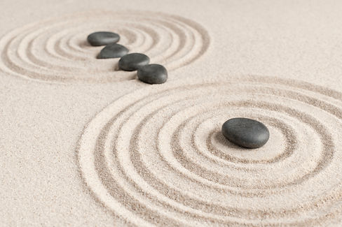 zen-stones-sand-background-health-wellness-concept.jpg