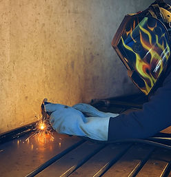 Welding Worker By Wind Rose Fencing