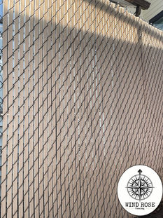 Residential White Privacy Slat Fence Installation