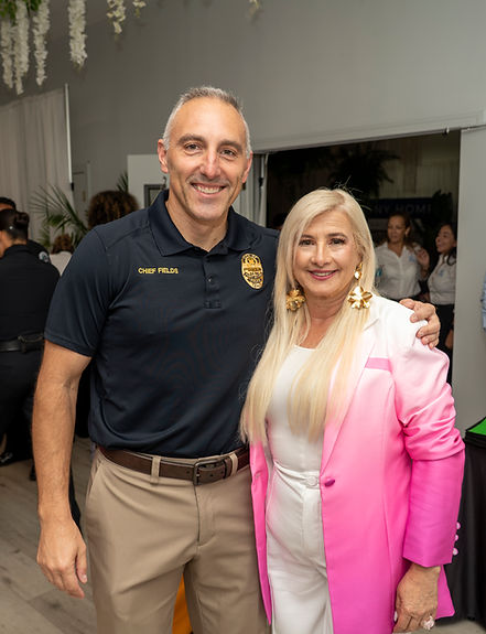 Chief of Police of Fort Myers - Jason Fields with Silvia B. Diez CEo of Mujeres Emprendedo