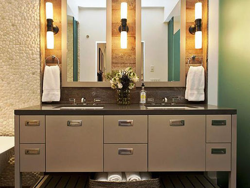 Cross illumination with wall sconces for your bathroom.