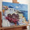 Thumbnail: Textured oil painting of Santorini village and sea views