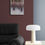 Thumbnail: Vertical winter forest artwork displayed above black sofa