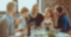 Multigenerational family sharing a meal, symbolizing legacy, connection, and retirement planning rooted in family values.