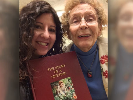 Carmen and Dodee with her memoirs, a reflection of love, planning, and a life well lived.