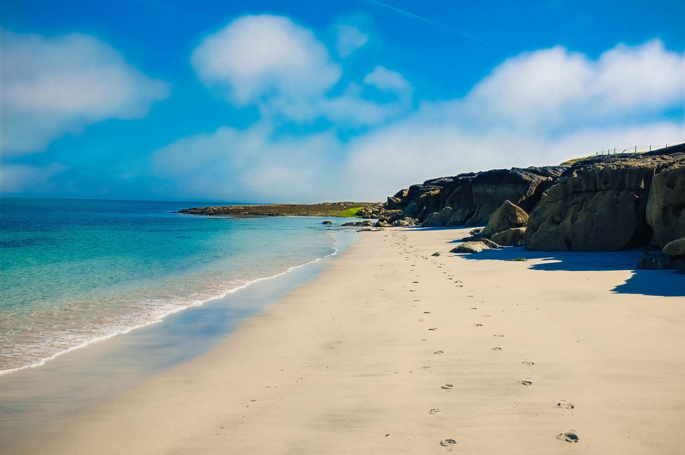 Gorgeous beaches of Inis Oirr inhabited by celebrity dolphins, soft grey sands, and rock formations.