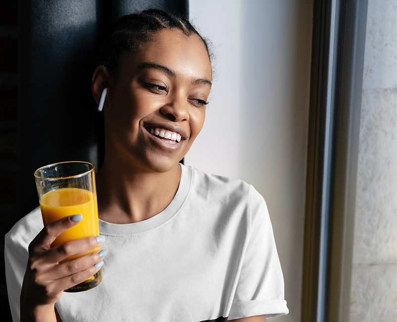 t-shirt-mockup-featuring-a-woman-drinking-orange-juice-by-a-window-m11491-r-el2.png