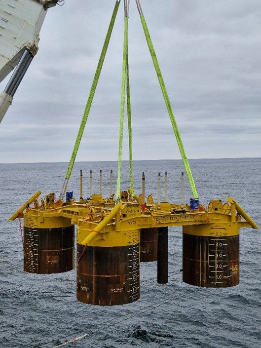 Bestla Subsea Template being lifted from the installation vessel and slowly submerged towards its final position.