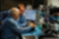 image of engineer technicians working on the scan device in a lab setting