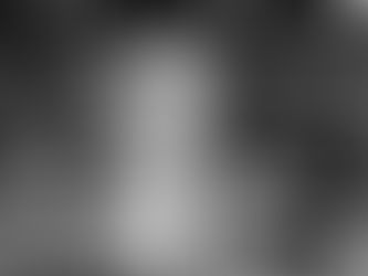 Holly smiling in front of the new team members Liz and Oliver.