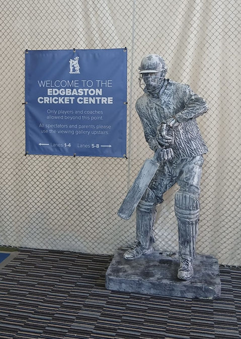 Cricketer living statue