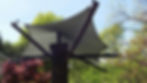 Assembly of tree shade fabric canopy