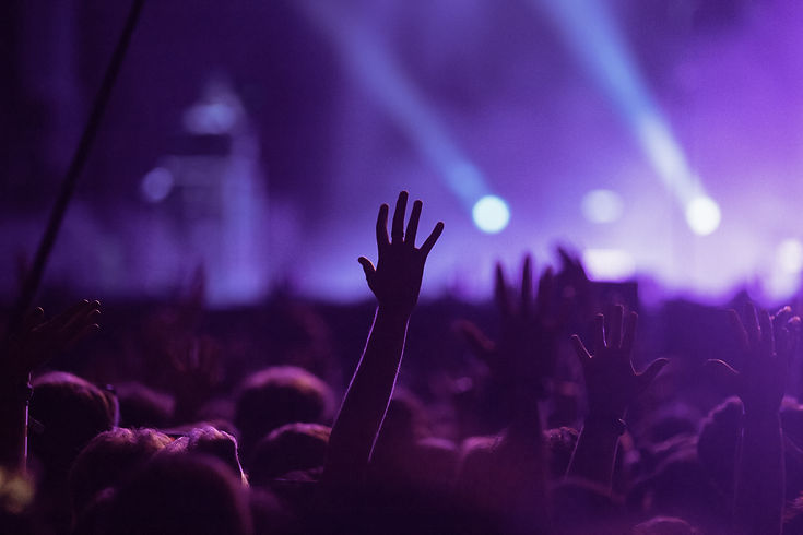 enthusiastic-crowd-raising-hands-at-concert-2026-03-24-22-15-55-utc.jpg