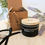 Thumbnail: Scented Candle Tin Shown with Gift Box and Ribbon