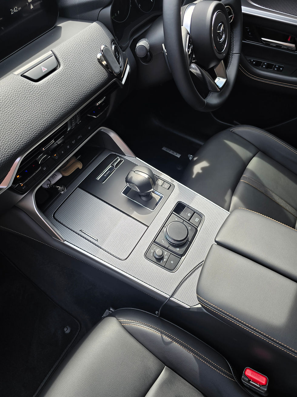 Close-up view of a car dashboard showing a clean and modern interior