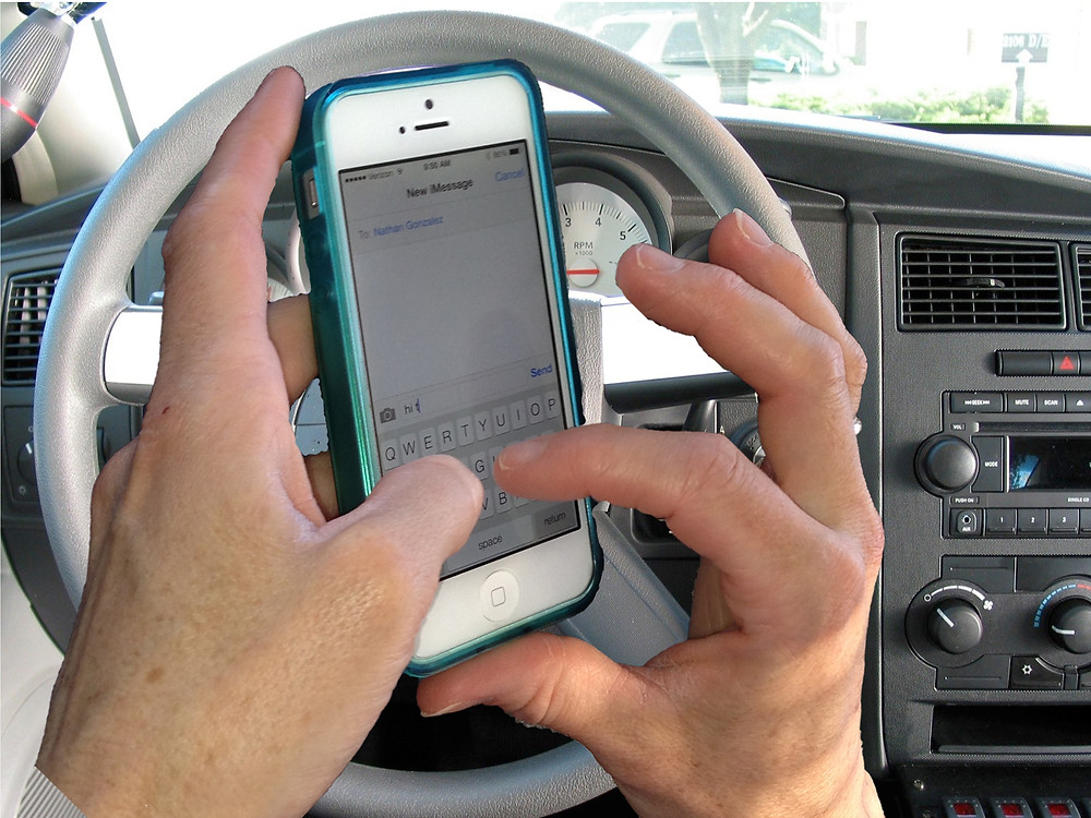 Bill banning texting while driving heads to Idaho governor