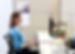An operative using an ergonomic monitor arm for the best posture