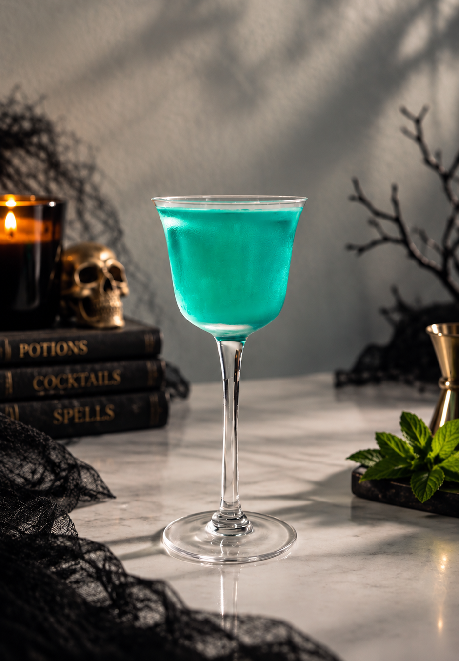 Vibrant green witch's brew cocktail served in a glass for a Halloween party.
