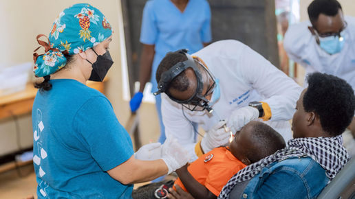 HHOA dentist providing care to a patient during a dental outreach