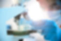 Scientist Using Microscope