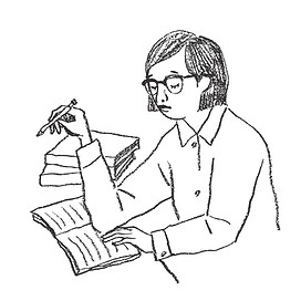 ノートに何かを書いている女性