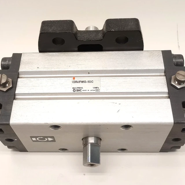 SMC CDRA1FW63-100C Used Pneumatic Rotary Actuator 17mm Shaft OD 13mm