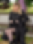 une photo de mode qui présente une jeune femme blonde portant une robe et un trench coat du créateur ZAWANN, chaussures bottes de la maison Chloe