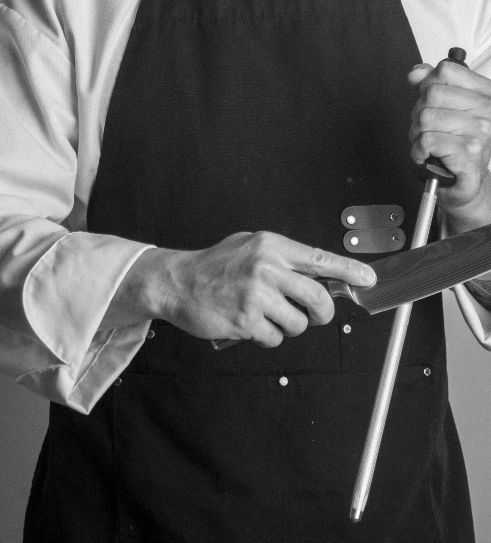 Private Chef Sharpening a Knife