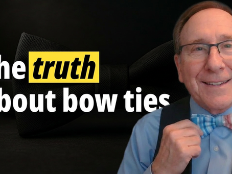 Glenn Schwartz holds bow tie.