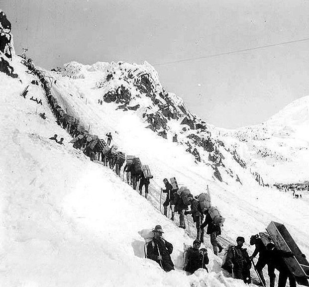 Chilkoot Pass during the Klondike Gold Rush, specifically showing prospectors and packers climbing the pass in September 1898.