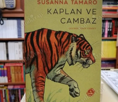 ÜÇ ADAM BİR KAPLAN