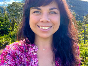 Katherine Tatsuda on top of a mountain in Ketchikan Alaska