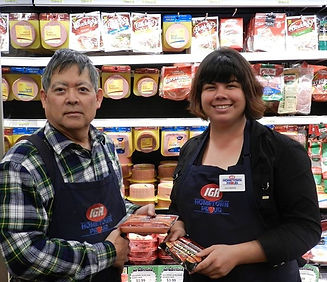 Katherine and Bill Tatsuda inside of Tatsuda's IGA in 2016