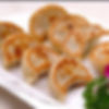 E8 Gyoza au poulet (4 pièces)