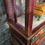 Thumbnail: Tall Indian inspired glass paneled bookcase