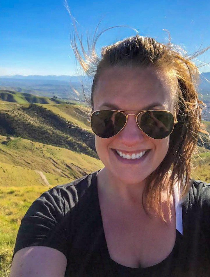 selfie taken while hiking in the wither hills farm park of blenheim marlborough south island new zealand on a sunny autumn day, allie albanese, wine writer, travel writer, discover, travel the world, explore new zealand, solo traveler, traveling alone