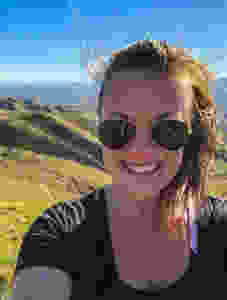 selfie taken while hiking in the wither hills farm park of blenheim marlborough south island new zealand on a sunny autumn day, allie albanese, wine writer, travel writer, discover, travel the world, explore new zealand, solo traveler, traveling alone