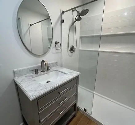 basement full bathroom Alexandria VA — egress-compliant remodel with tile shower by Vale C