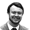 Smiling man in suit, headshot
