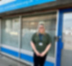 A support worker stood outside of the Harbour office